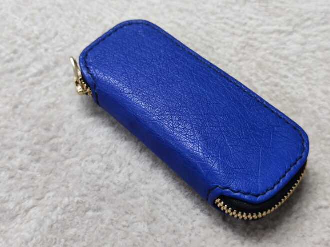 etui peau autruche couteau pliant zippé